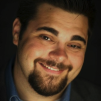 Headshot of Mac Moreau