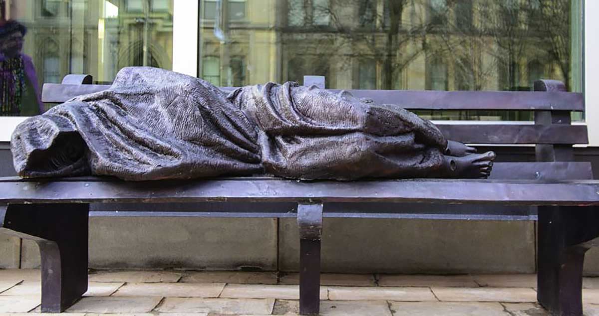 Homeless Jesus by Timothy Schmalz outside Regis College, University of Toronto.
